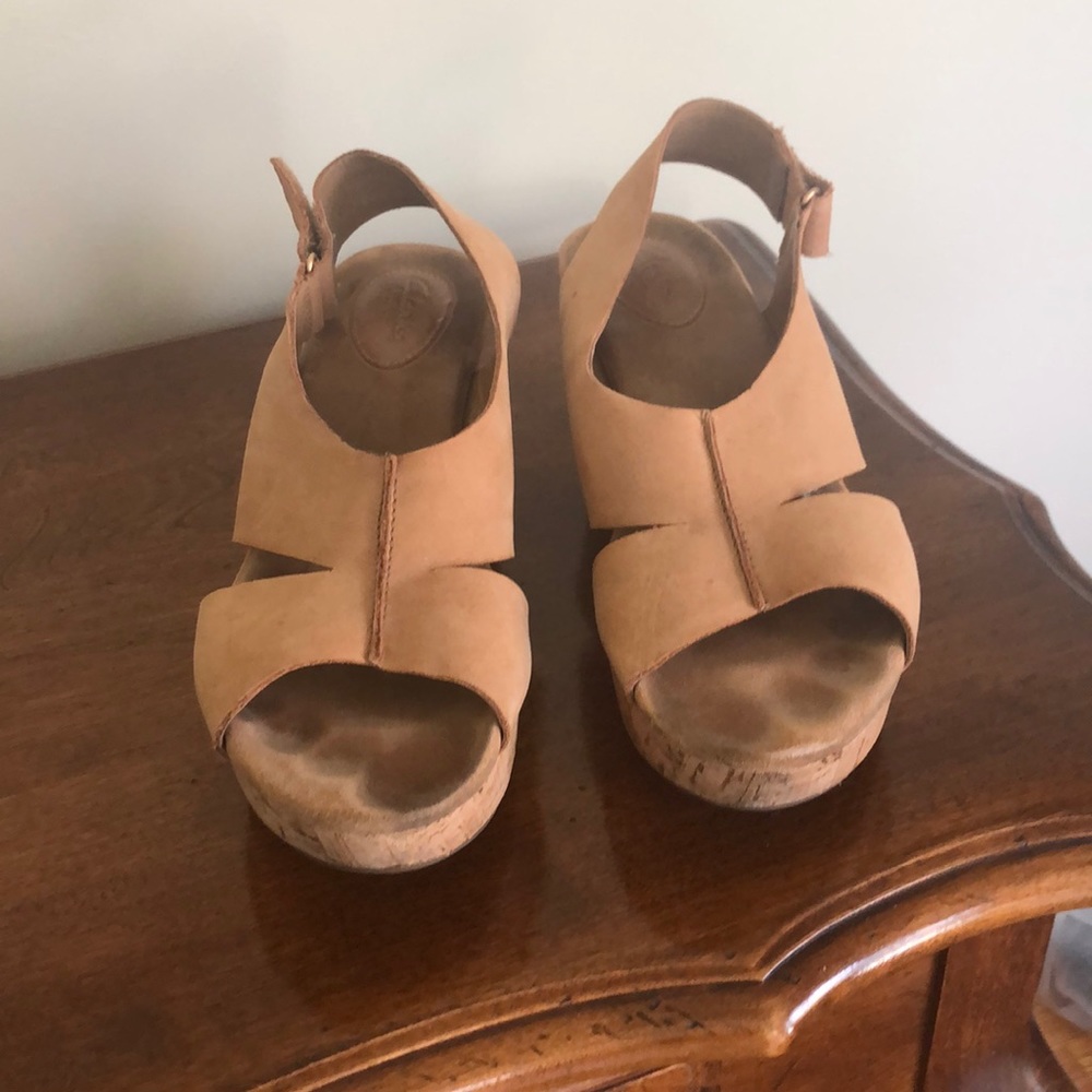 Tan wedge sandal.